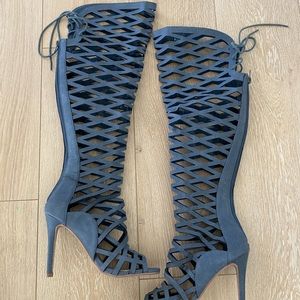 Knee length denim boots